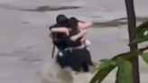 Italy floods: Heartbreaking footage of three friends hugging before being swept away