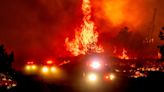 California’s largest wildfire explodes in size as fires rage across US west