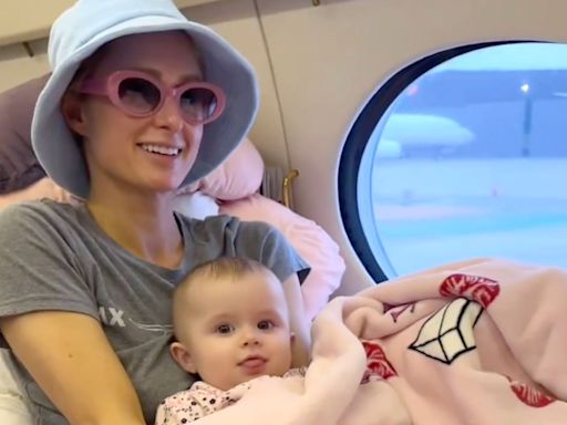 Paris Hilton Shares Adorable Videos of Daughter London Wrapped in a ‘That’s Hot’ Blanket Inside a Jet on Family Vacation