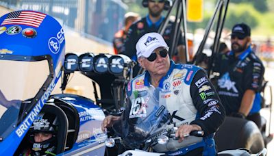 NHRA legend John Force walking with assistance after Traumatic Brain Injury from crash