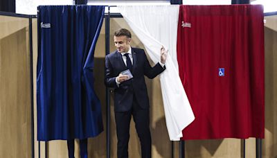 France’s left-wing parties projected to finish first in parliamentary elections, keep far right at bay