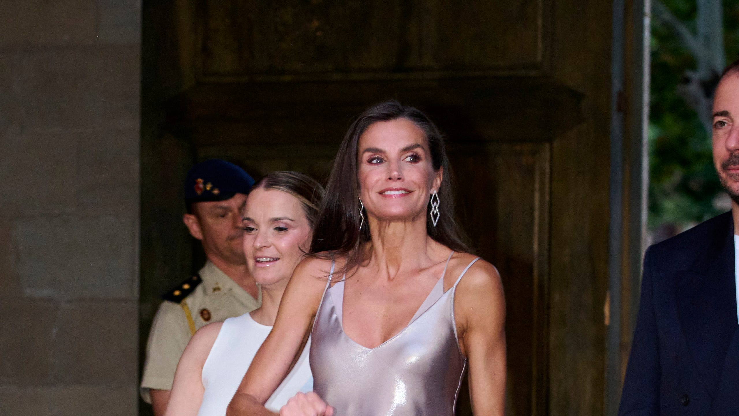 Queen Letizia Turns Heads in Spain in a Plunging Lustrous Slipdress