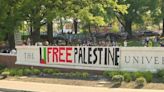 Pro-Palestinian protesters chant, sing despite being told to leave at Johns Hopkins University