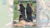 Real Photo Shows Naked Women Walking Past Women in Burqas?