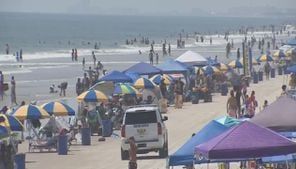 ‘I really like it here’: visitors, residents flock to Central Florida beaches
