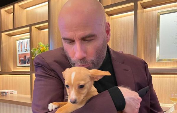 John Travolta Shares Throwback Pic of ‘Day We Adopted’ Dog Peanut ‘on Oscar Night’