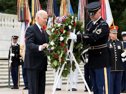 Biden honors fallen troops on Memorial Day, praising commitment "not to a president," but to idea of America