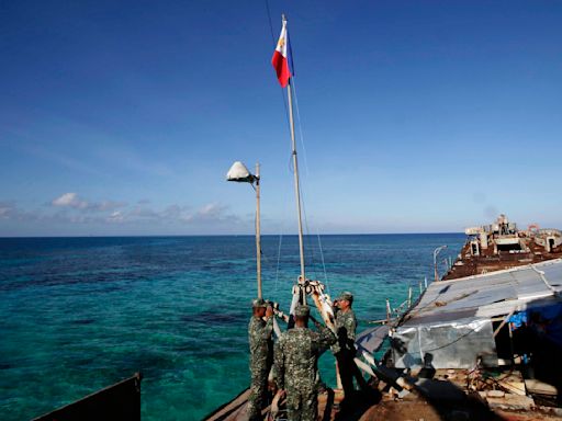 Philippines says China coast guard seized food dropped by plane for Filipino forces in disputed sea