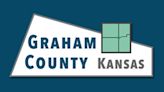 Graham County commissioner charged in two cases