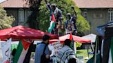 ...Palestinian protest encampment is seen in front of the Tommie Smith and John Carlos statues at San Jose State University on Tuesday, May 14, 2024, in San Jose...