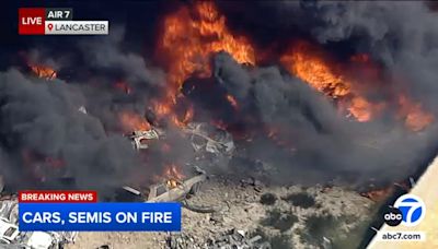 Hundreds of cars burning at Lancaster salvage yard, sending black smoke over desert