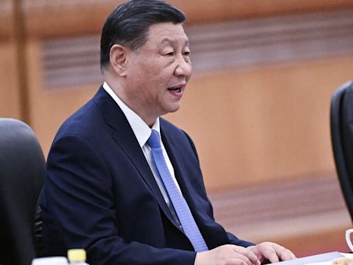 China's Xi calls for 'bridges' amid trade, diplomatic frictions