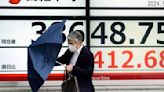 Stock market today: Asian shares mixed after calm day on Wall St