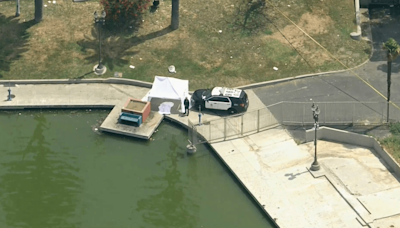 2 people arrested after body found in MacArthur Park Lake