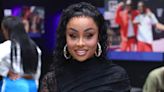Blac Chyna shows off her sculpted physique in sheer black bodysuit