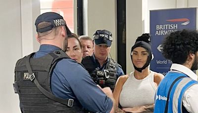 Moment Katie Price met by cops at airport with son Harvey as she’s arrested