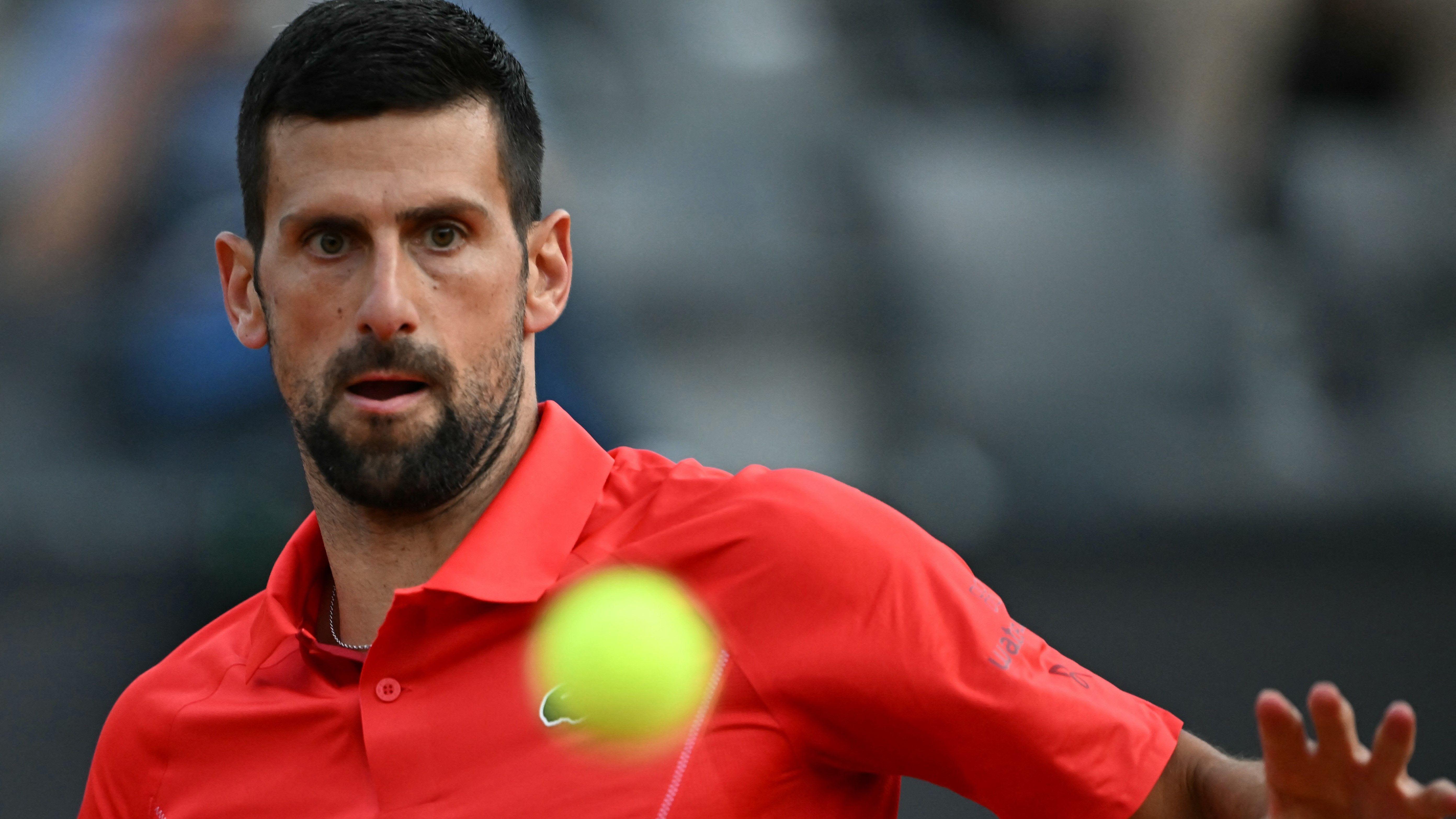 Djokovic struck by water bottle at Italian Open