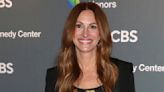 Julia Roberts wears dress covered in photos of George Clooney