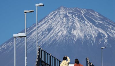 Second Japan town blocks view of Mount Fuji in battle with problem tourists