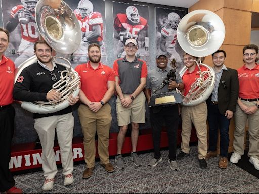 Watch The Ohio State Marching Band’s Sousaphone Players Invite Archie Griffin to Dot the 'i' vs. Akron