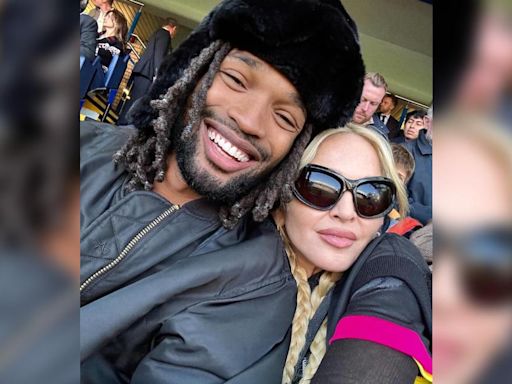 Madonna, 66, Looks Loved Up With Rumored Boyfriend Akeem Morris, 28, During Soccer Game Date in London: Photos