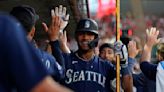 Suárez drives in run in club record 10th straight game as Mariners beat Angels 9-7 in slugfest