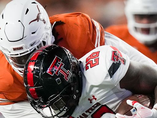 Texas NT T'Vondre Sweat continues to be difficult evaluation