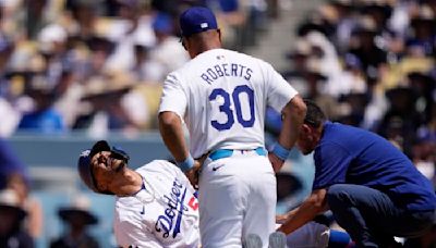 Mookie Betts put on IL by Dodgers with broken left hand after getting hit by fastball