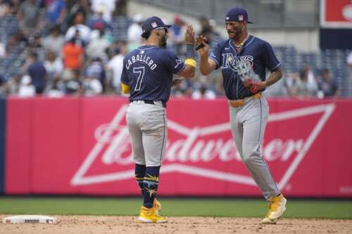 Bradley remains unbeaten in eight starts, Arozarena homers twice and Rays rout Yankees 9-1