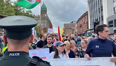 Anti-racism protesters rally at Belfast City Hall