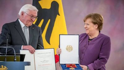 Merkel, turning 70, honoured as 'hallmark of democracy' by president