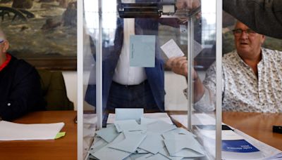 Live: Turnout estimated at 67% for second round of France’s snap parliamentary elections