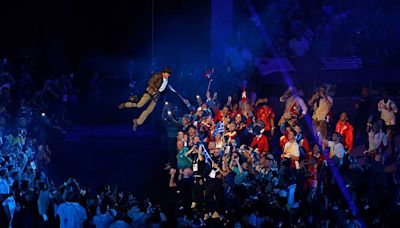 Tom Cruise crashes Paris Olympics closing ceremony with thrilling rappel, skydiving stunt