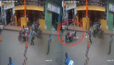 Policía de tránsito tumbó a pareja de motociclistas que no frenó en un retén y todo quedó en video: “parrillera se salvó de milagro”