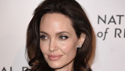 Angelina Jolie's Fashion Brand Might Have Dropped a Hint About Her Dating Life