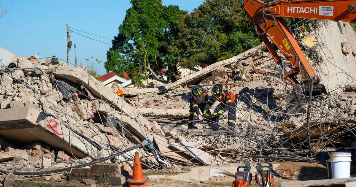 Death toll up to 32 in South Africa building collapse but rescue efforts boosted by 1 more survivor