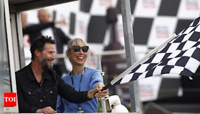 Keanu Reeves leaves fans excited with recent public appearance with girlfriend Alexandra Grant at racing event in Germany - See viral photos | English Movie News - Times of India