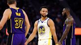 Steph Curry scores 33 as Golden State Warriors open title defense with win over Los Angeles Lakers; LeBron James scores 31