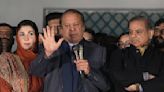 Pakistan's ex-PM Sharif says he will seek a coalition government after trailing jailed rival Khan