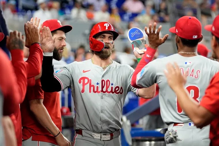 Phillies maul Marlins with 22-hit barrage, but J.T. Realmuto leaves with bruised left knee