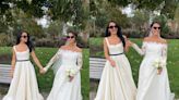 A woman rewore her wedding dress to her twin sister's nuptials to match the black-and-white dress code