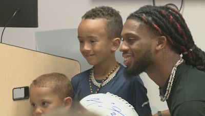 Buffalo Bills Damar Hamlin makes trip to connect with St. Louis patients