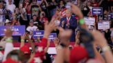 Trump openly embraces, amplifies QAnon conspiracy theories