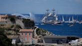 Olympic torch arrives in Marseille on famous ship amid celebration, tight security