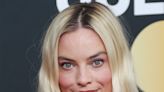 Margot Robbie Flashes Her Abs In A Black Peek-A-Boo Crop Top At The SFFILM Awards