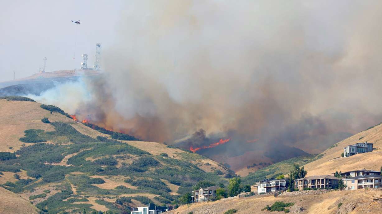 Fire crews battling blaze above Ensign Peak, evacuations underway