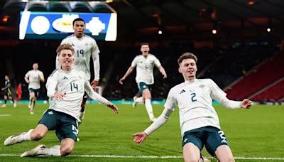 Conor Bradley 'over the moon' after his first international goal led Northern Ireland to victory over Scotland... but admits concern over Liverpool team-mate Andy Robertson's ...