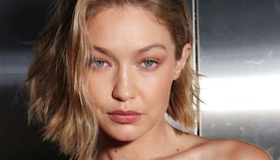 Gigi Hadid rocks a mini dress made *entirely* of packing tape