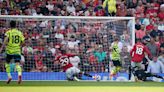 Arsenal takes title race with Man City to final day of Premier League season