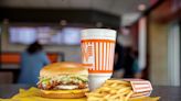How much has the price of a burger at Whataburger changed since opening in 1950?